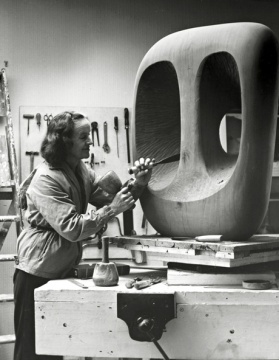 Hepworth carving Hollow Form with White Interior in 1963. Photograph: Val Wilmer/Courtesy Bowness, Hepworth Estate
