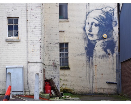 Girl with a Pierced Eardrum (2014)
Photo: Banksy
